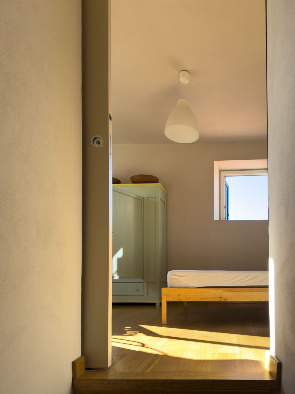 A small, tidy bedroom interior