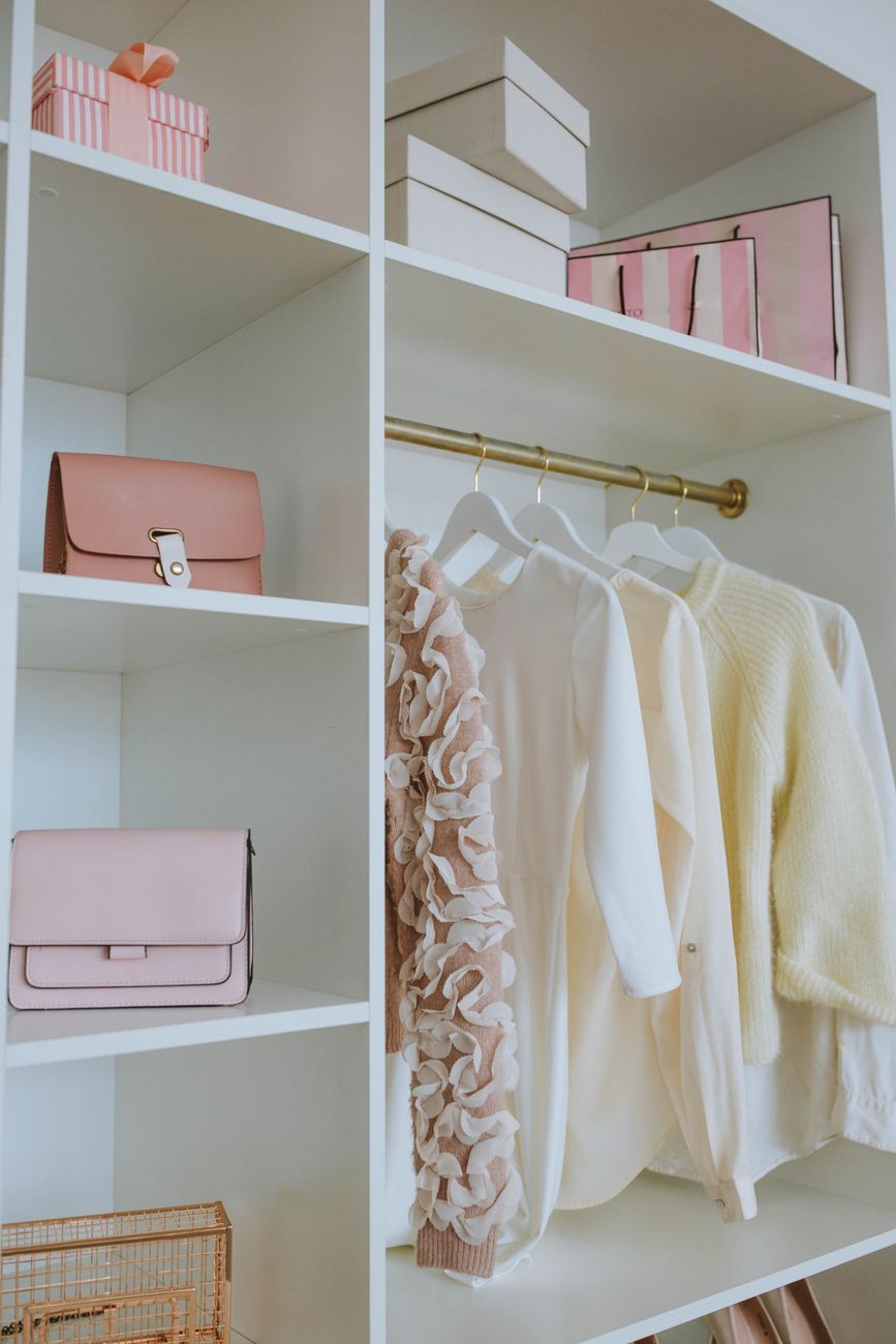 Storage boxes stacked on closet shelves